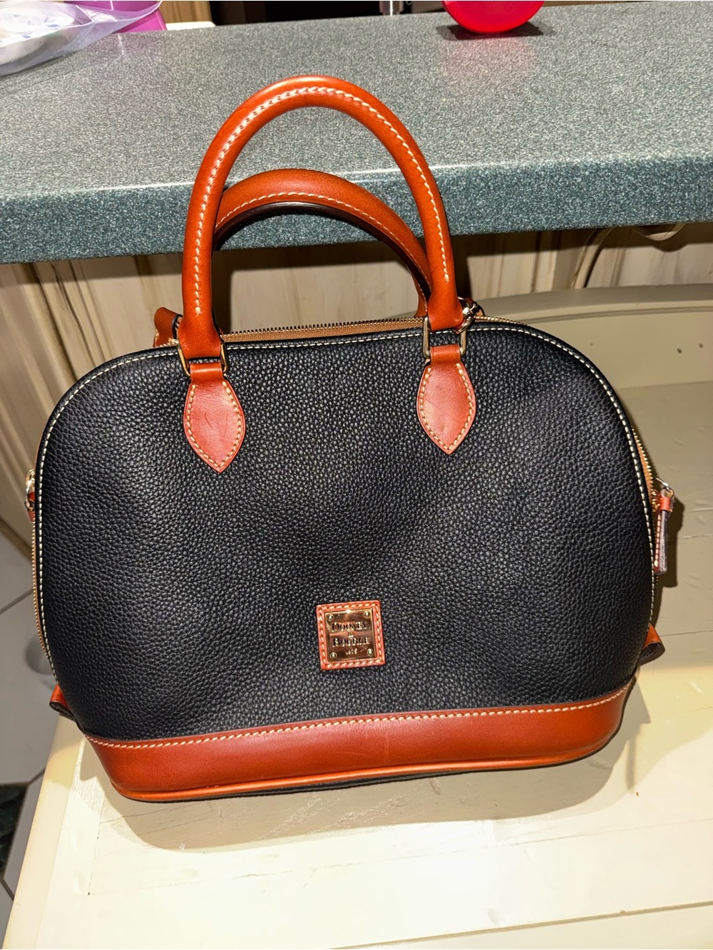 Dooney & Bourke Black Pebble Leather Satchel with Brown Trim